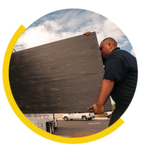 Man Moving Plywood Circle - American Western Distribution