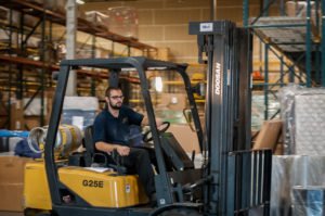 Driving Forklift - American Western Distribution